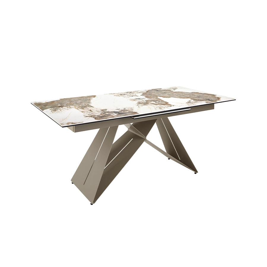 Mesa de Comedor Extensible 1114 cerrada a 180 cm, vista en tres cuartos sobre fondo blanco, con el tablero de porcelánico entero y el mecanismo oculto