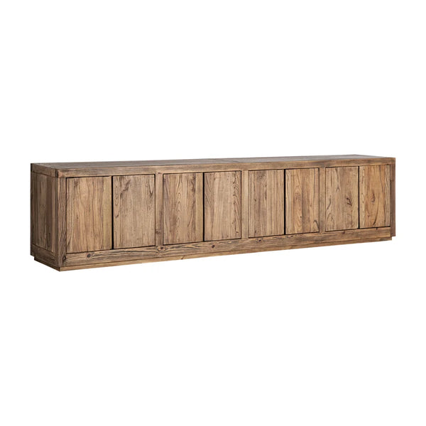 Mueble TV Norvik en ángulo, con sus 280 cm de largo, el lateral macizo y el zócalo retranqueado